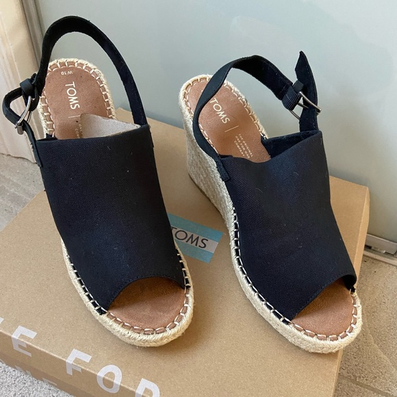 Toms Shoes - Toms - NEW - Monica - woman’s sling back wedge heels. Black coloured. Size 10.